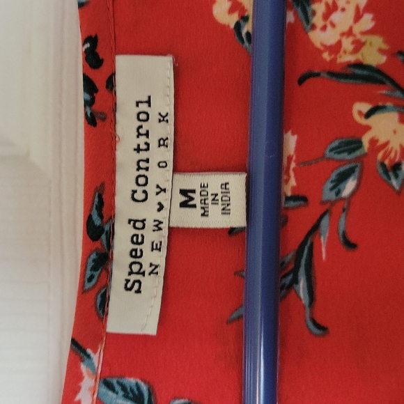 Women's Medium Quarter sleeve Dress. Orange with floral print design. - Picture 8 of 14